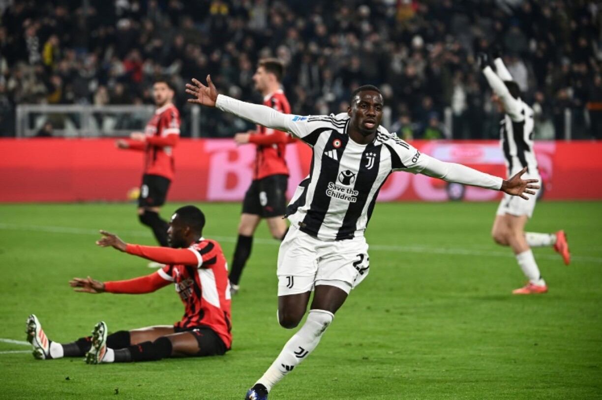 Timothy Weah celebrates scoring Juventus' second goal against AC Milan