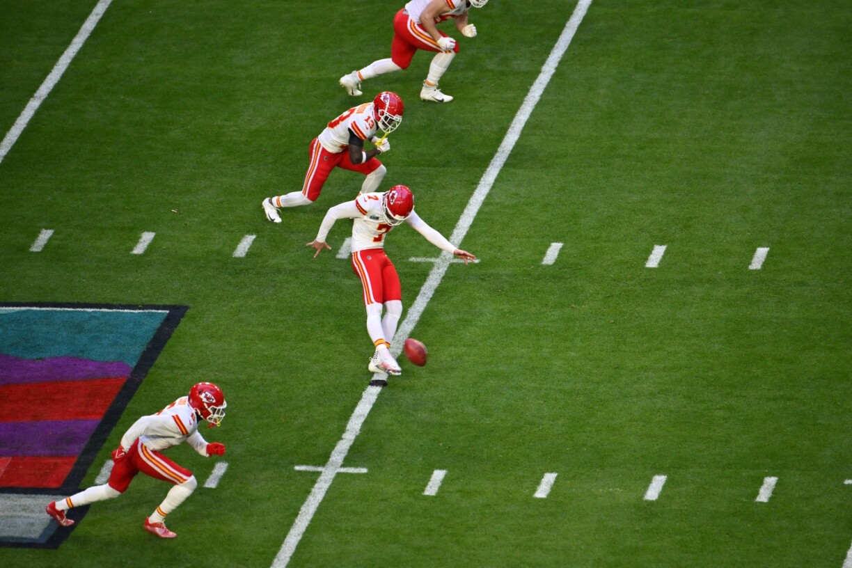 Kansas City Chiefs' kicker Harrison Butker kicks the ball for kickoff Super Bowl LVII between the Kansas City Chiefs and the Philadelphia Eagles at State Farm Stadium in Glendale, Arizona, on February 12, 2023.