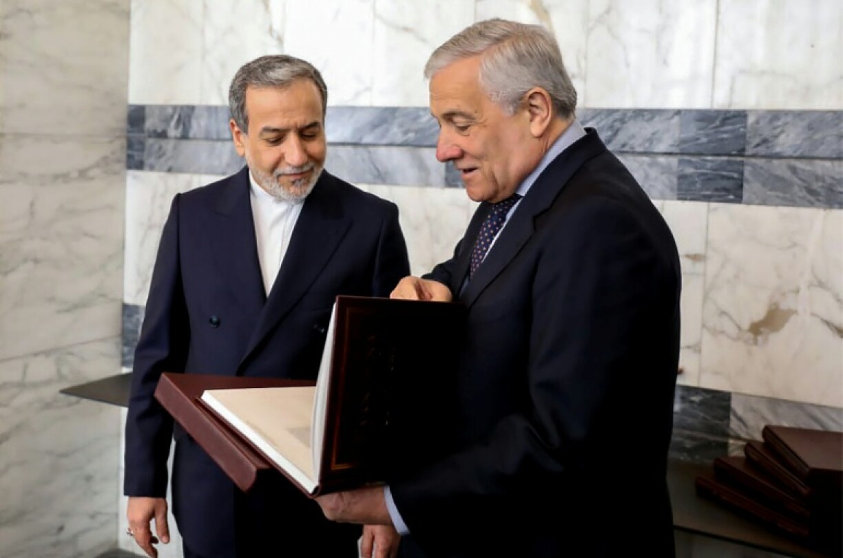 A picture provided by the Iranian Ministry of Foreign Affairs shows Iran's Foreign Minister Abbas Araghchi (L) meeting his Italian counterpart Antonio Tajani in Rome