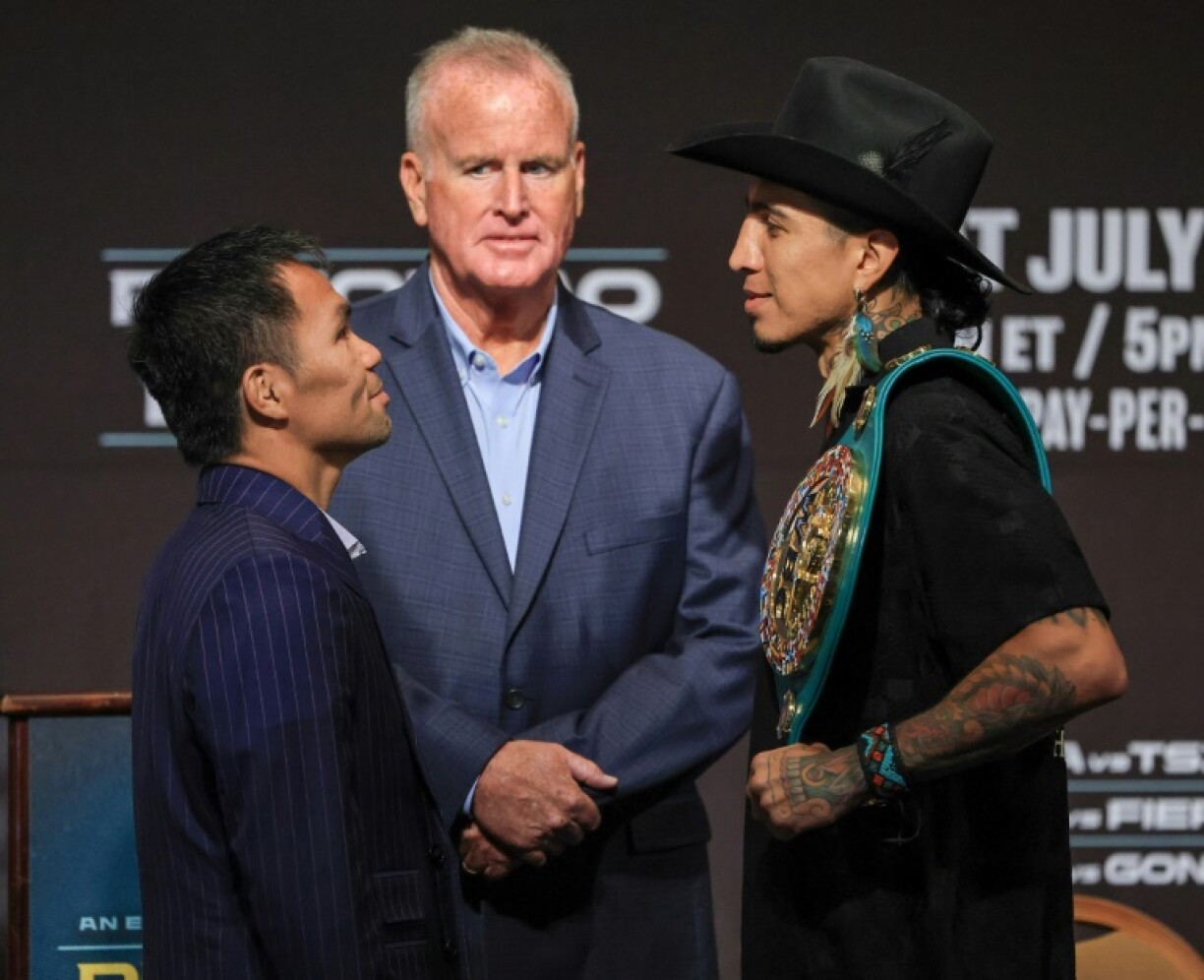 Manny Pacquiao (left) faces off against WBC welterweight champion Mario Barrios (right) ahead of their world title fight in Las Vegas