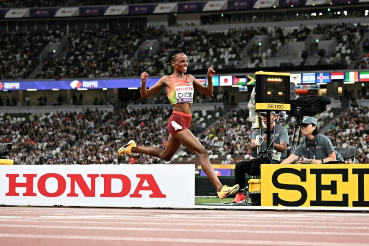 Kenya's Beatrice Chebet celebrates after winning the world 10,000m title