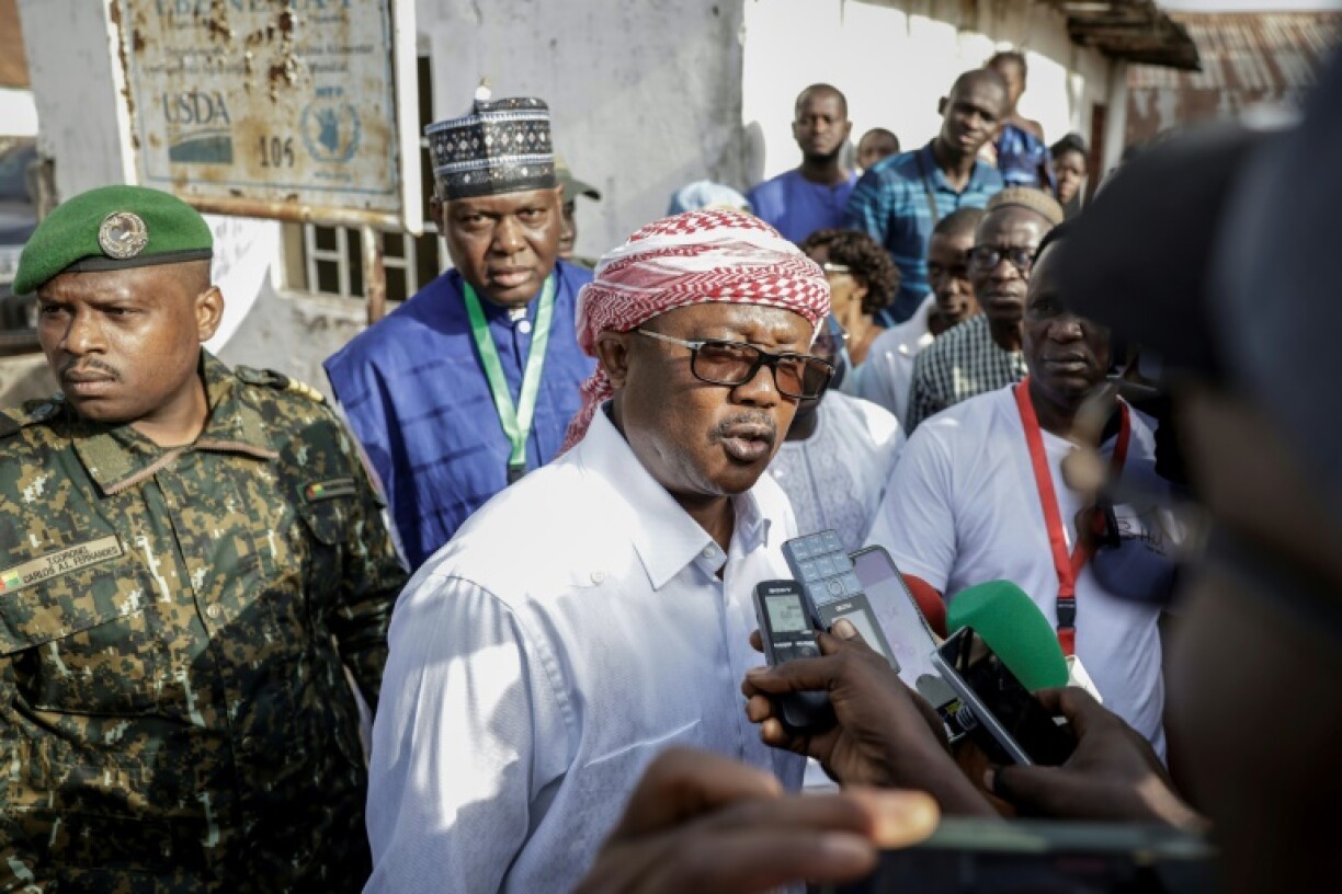 Guinea-Bissau President Umaro Sissoco Embalo speaks to the media after casting his ballot in Gabu on November 23, 2025