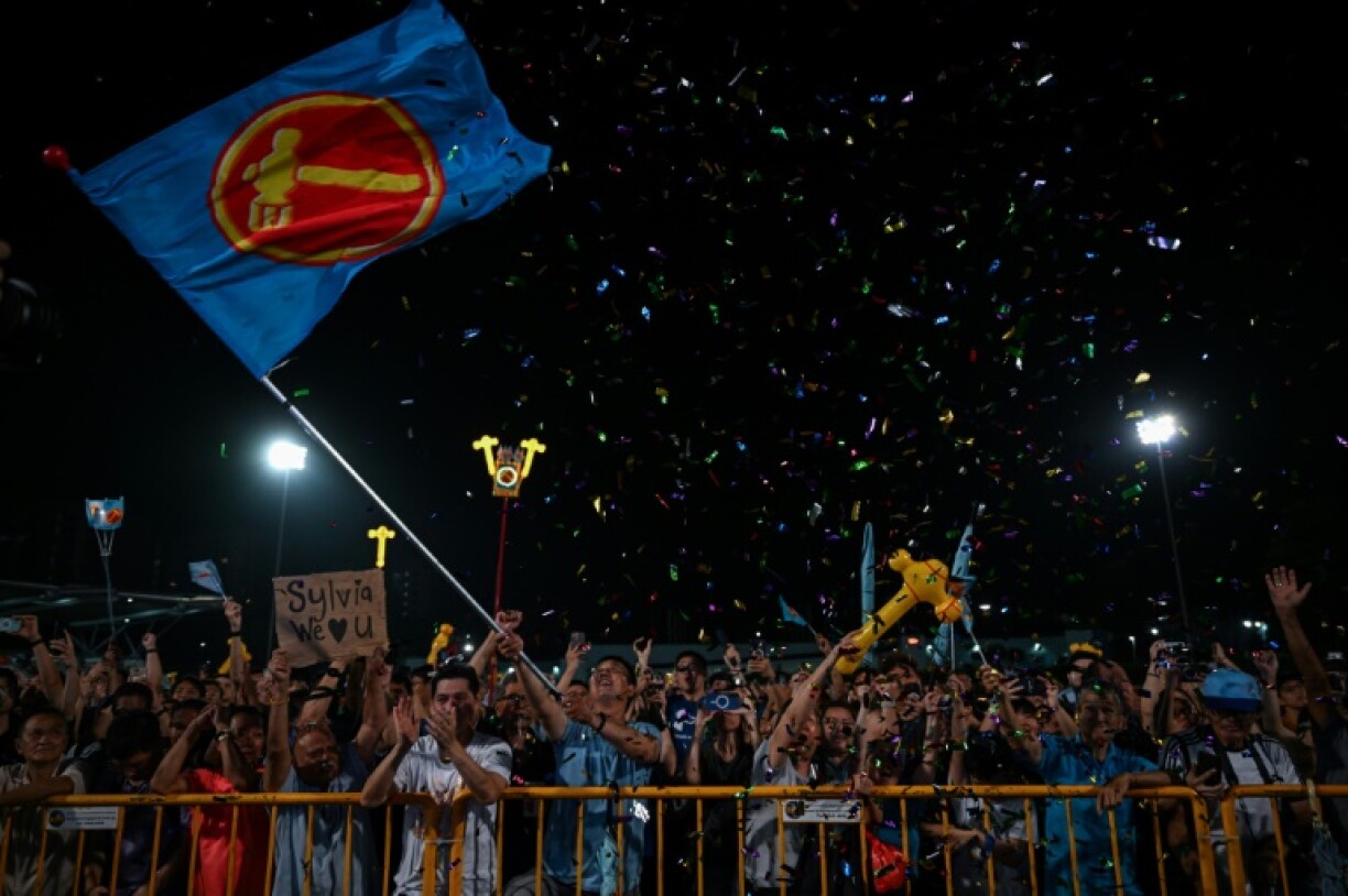 Supporters of Singapore's opposition Worker's Party (WP) gather at Serangoon Stadium to wait for election results