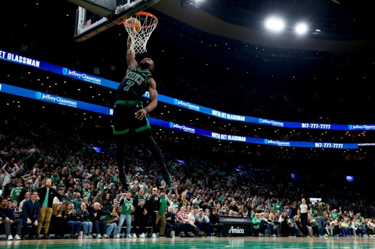 Boston's Jaylen Brown throws down a dunk in the Celtics' NBA victory over the Indiana Pacers