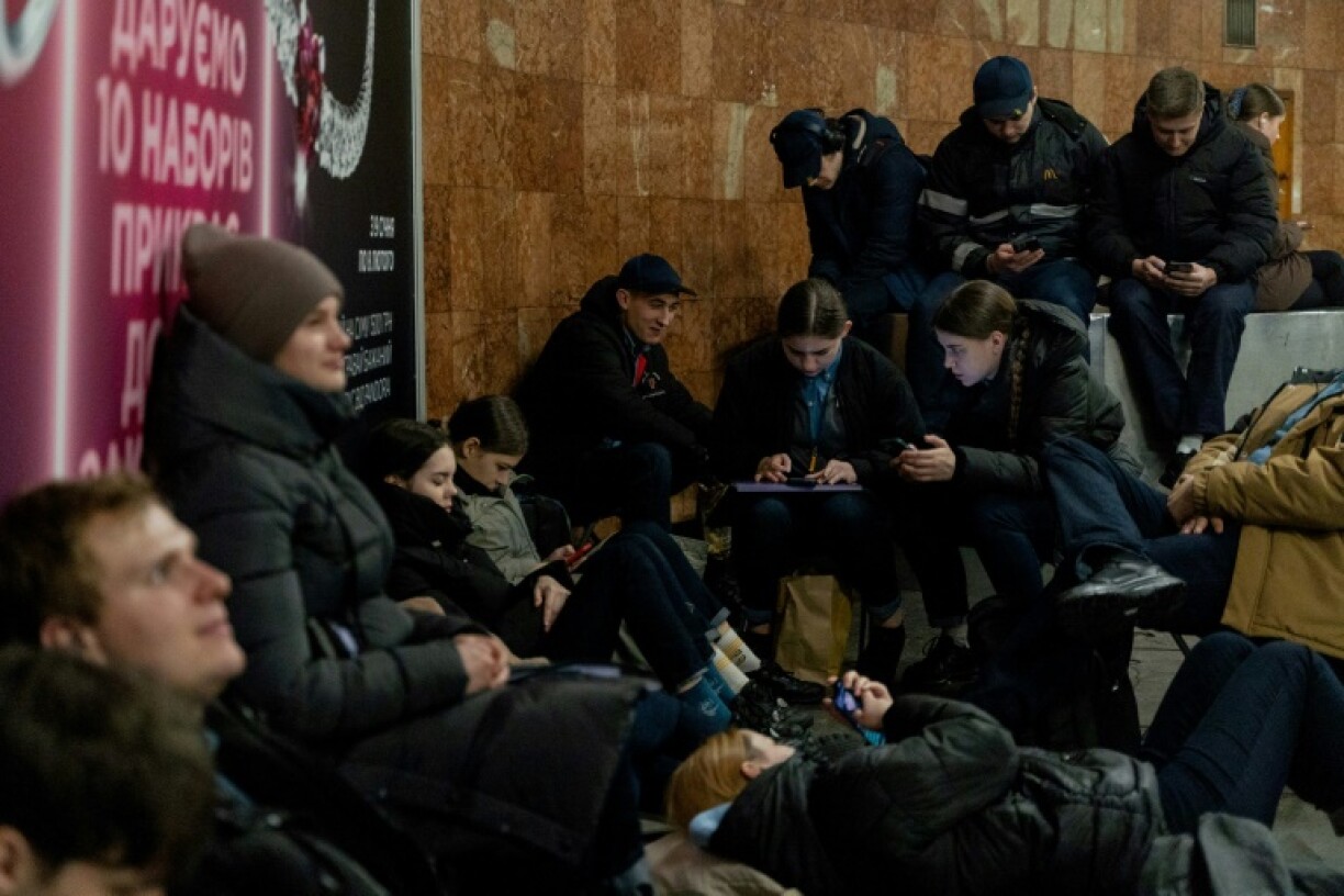 Ukrainians take shelter in a metro station during an air raid warning was issued in Kyiv