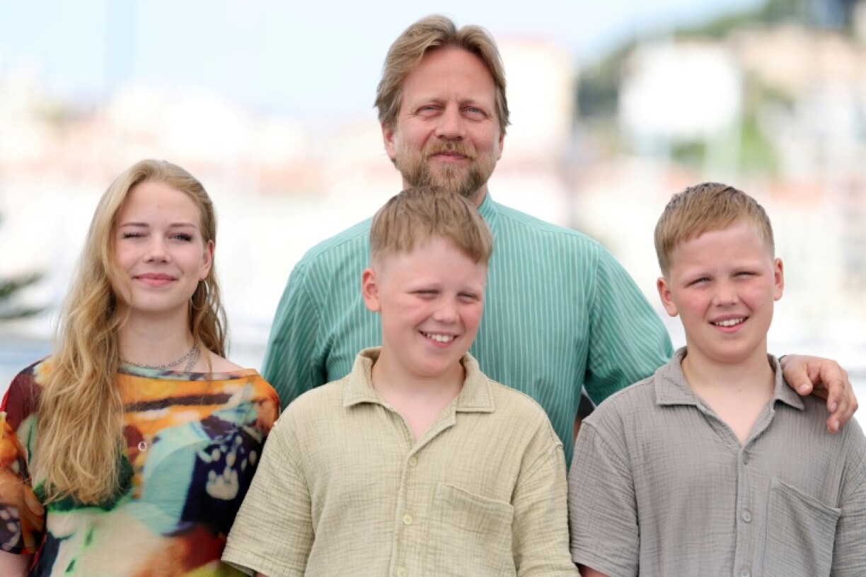 Palmason with cast members Ida Mekkin Hlynsdottir, Thorgils Hlynsson and Grimur Hlynsson -- minus Panda