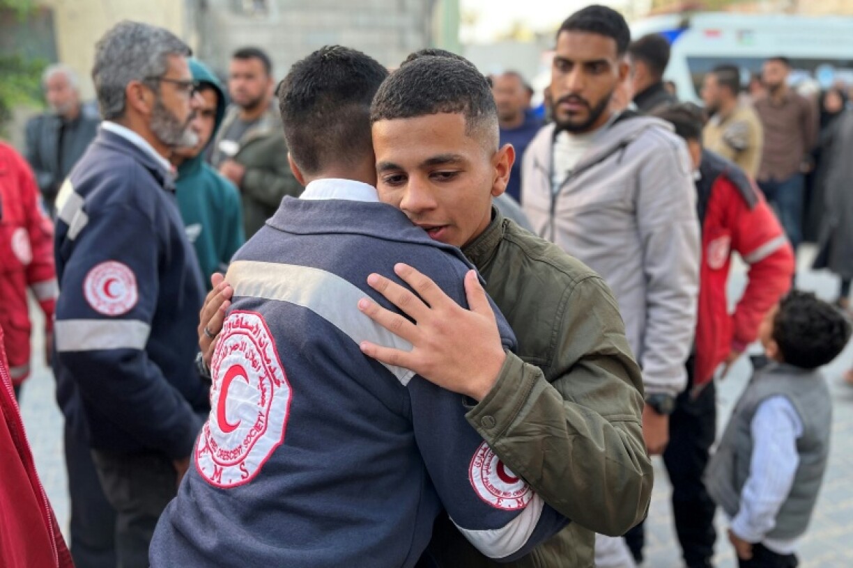 Gazans outside a hospital in the territory's south after the Red Crescent announced the deaths of formerly missing rescuers