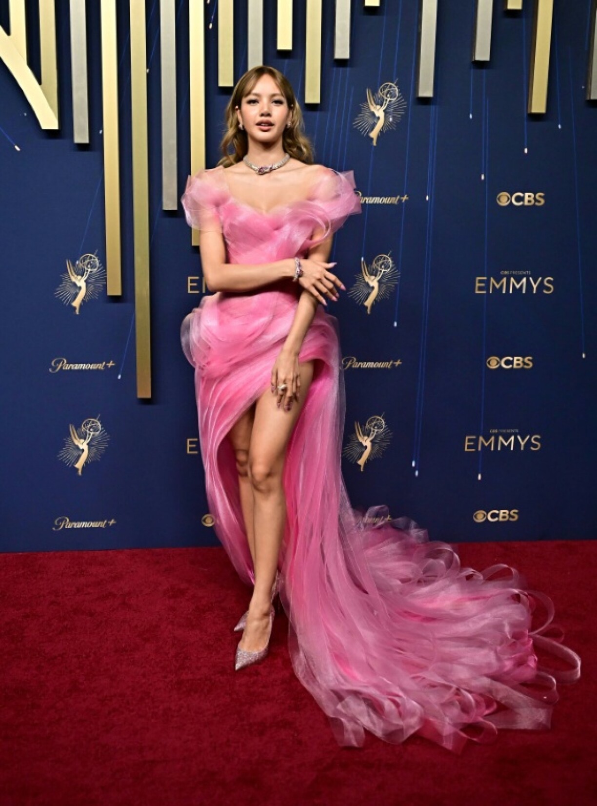 Blackpink star Lisa, who made her acting debut in 'The White Lotus,' stunned in a pink gown at the Emmys