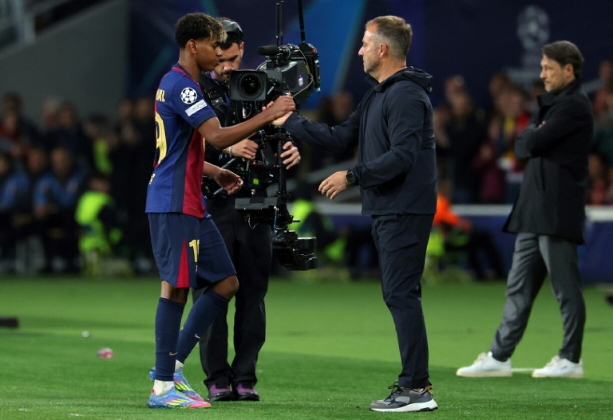 Hansi Flick (R) said his team can still improve after they brushed aside Borussia Dortmund in their Champions League quarter-final first leg match