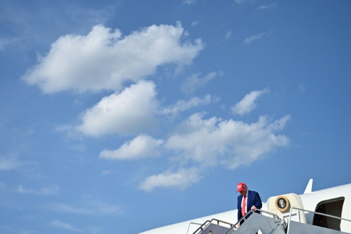 US President Donald Trump steps off Air Force One at Joint Base Andrews in Maryland on June 21, 2025 upon return from his golf club in Bedminster, New Jersey.