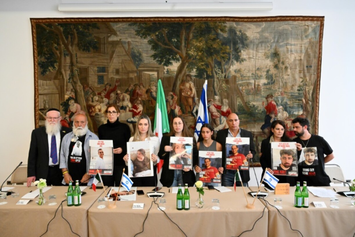 Relatives of Israeli hostages, including Tamir Nimrodi, give a press conference on April 8, 2024 in Rome