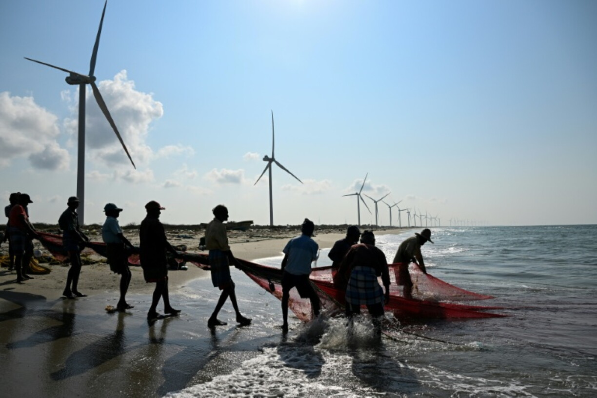 Since they appeared six years ago, the Mannar wind in turbines in Sri Lanka have been blamed for a host of problems -- from dwindling catches to floods, fuelling opposition to green energy projects as fuel costs soar