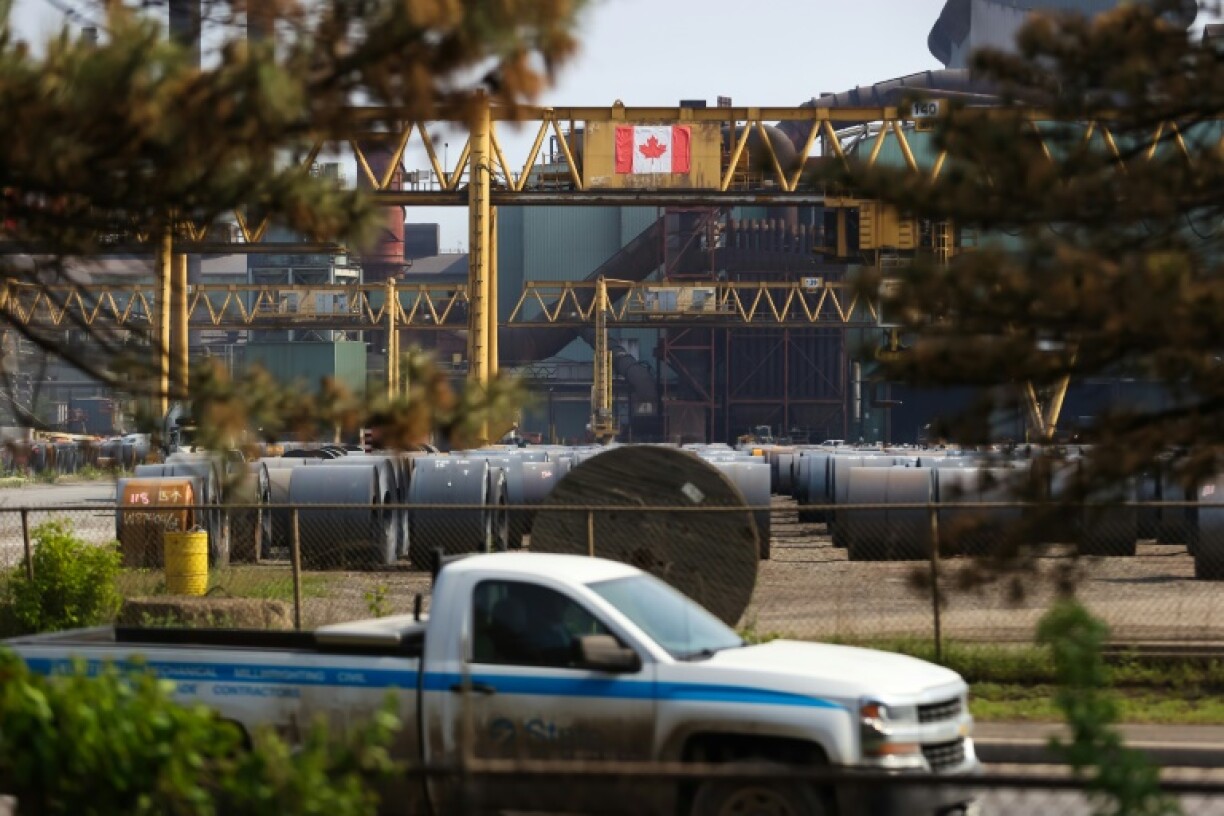 Coils of steel sit in a yard at Stelco's Hamilton Works in Hamilton, Canada
