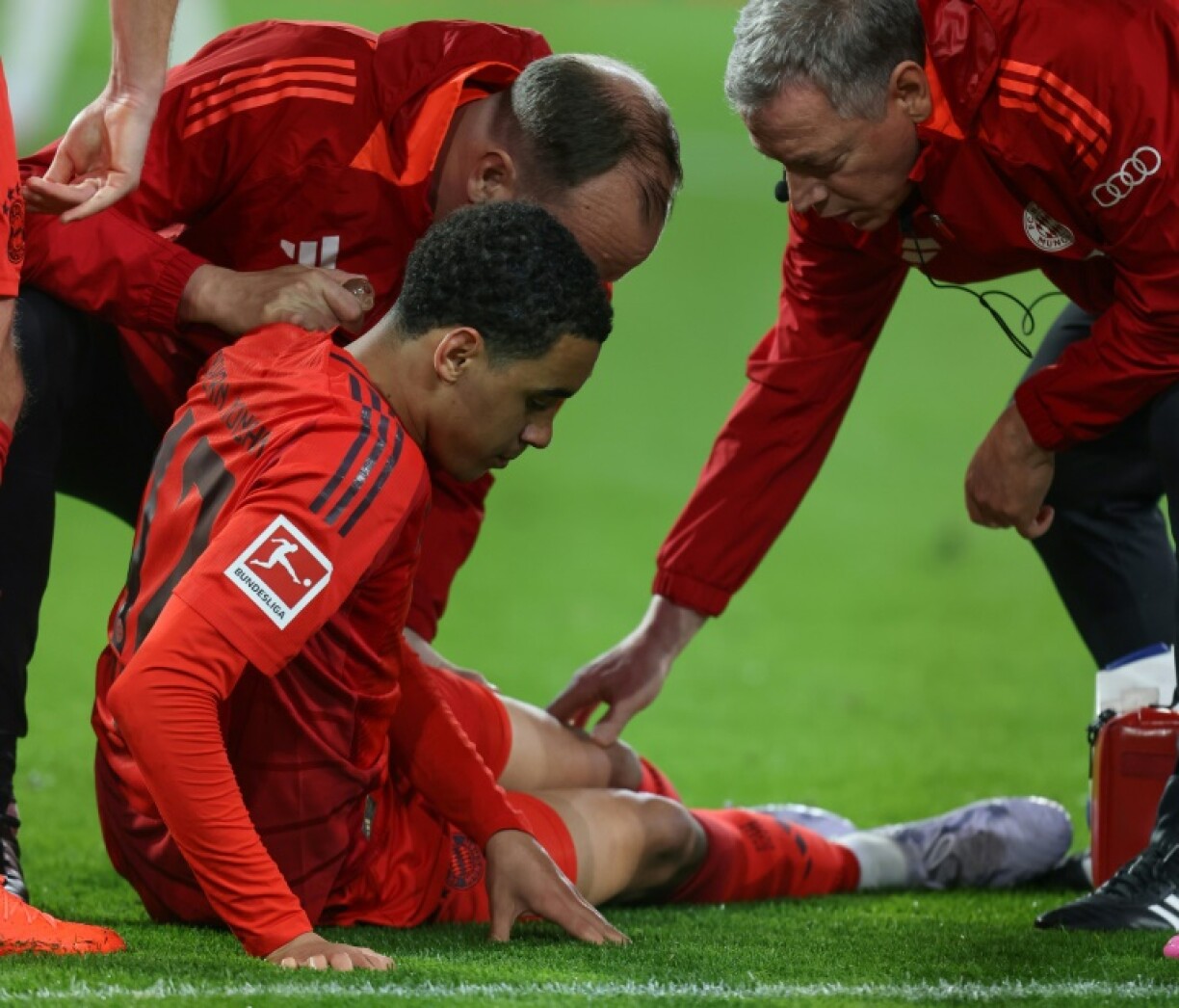 Bayern Munich midfielder Jamal Musiala was taken from the field with injury in Friday's Bundesliga match at Augsburg.
