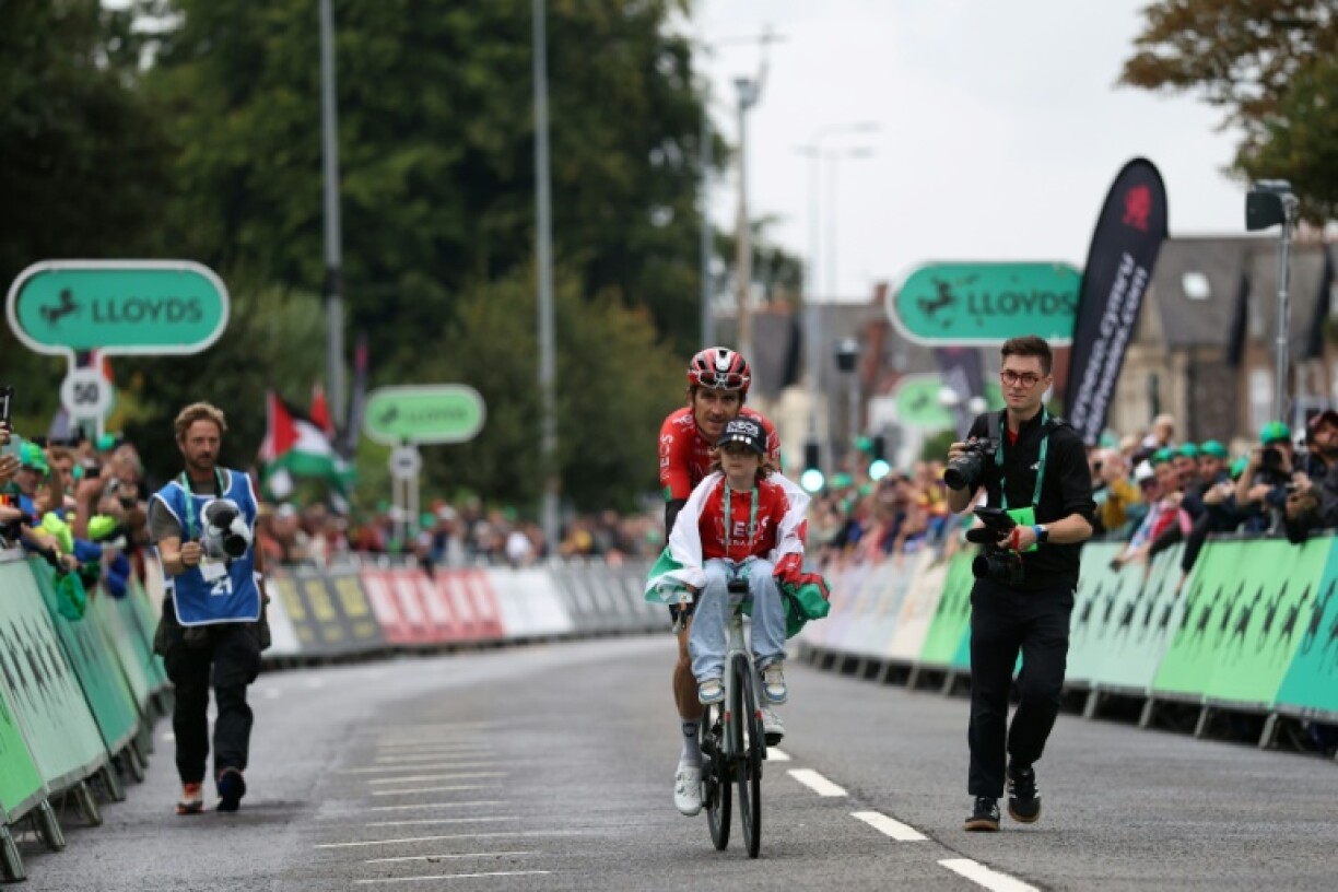 Geraint Thomas goes for a spin in Cardiff after his last professional stage with son Macs on his handlebars