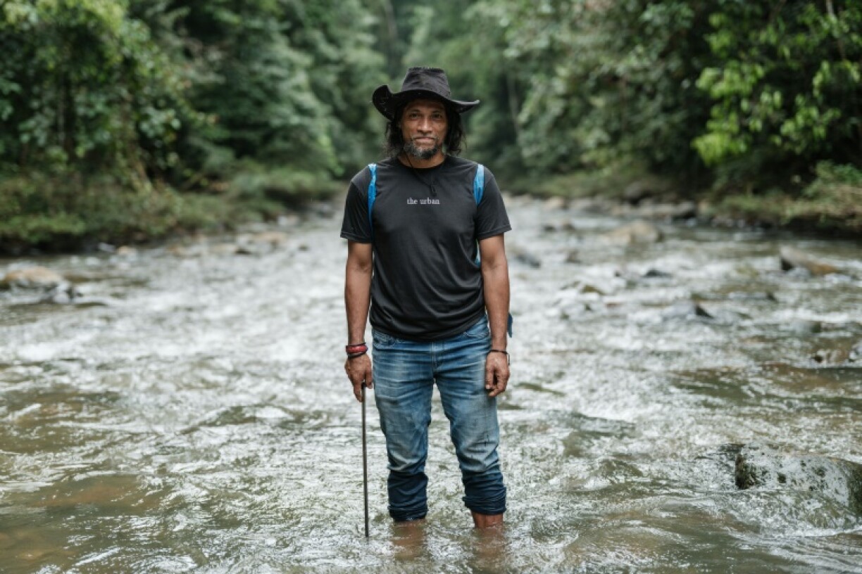 Bokum, one of Indonesia's last isolated hunter-gatherers, has a simple message for the nickel miners threatening his forest home: