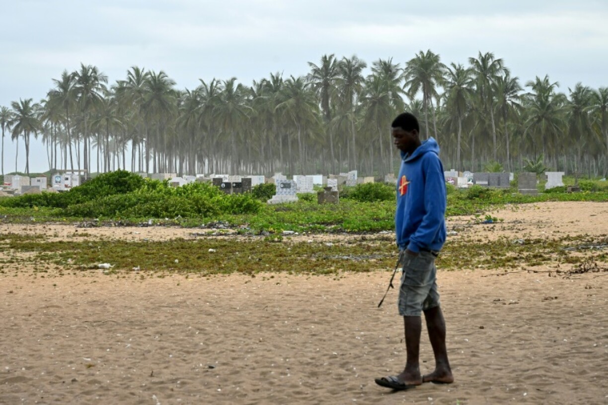 Villagers have had to rebury their relatives at a new cemetery well away from the sea due to erosion of the original coastal site