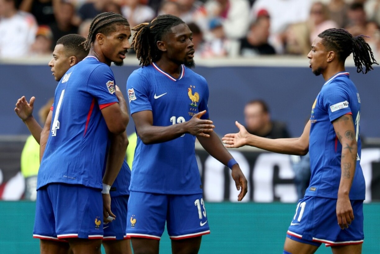 Loic Bade (2nd L) made his full French international bow earlier this year