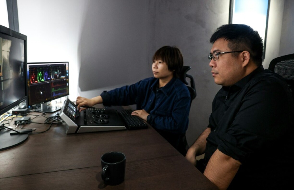 Yi Liu (R), one of 10 directors involved in Taiwanese television series