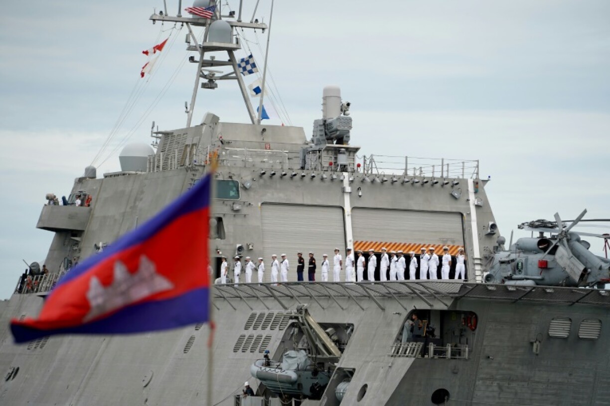 Crew members of the USS Savannah line up as they prepared to dock in Cambodia's port city of Sihanoukville this week