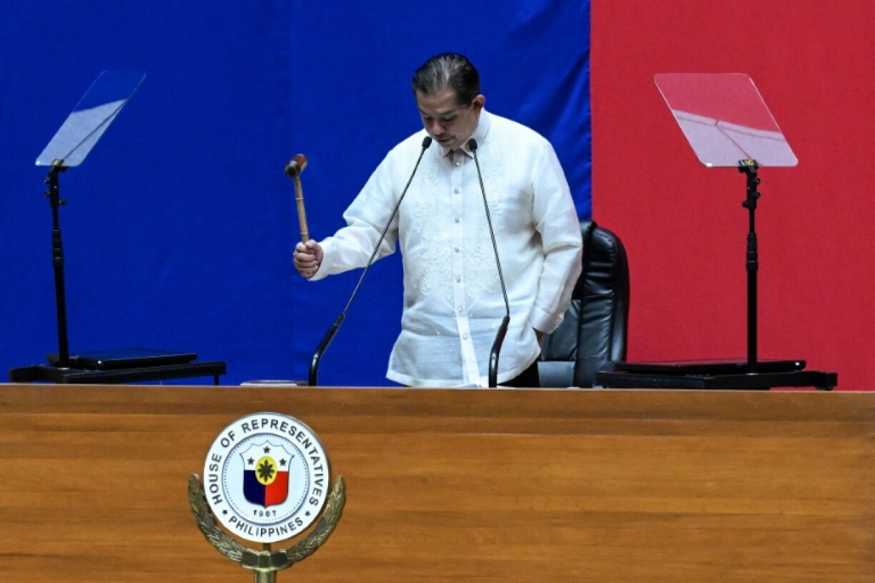 Speaker of the House Martin Romualdez wields the gavel as he confirms the impeachment vote of Philippine Vice President Sara Duterte