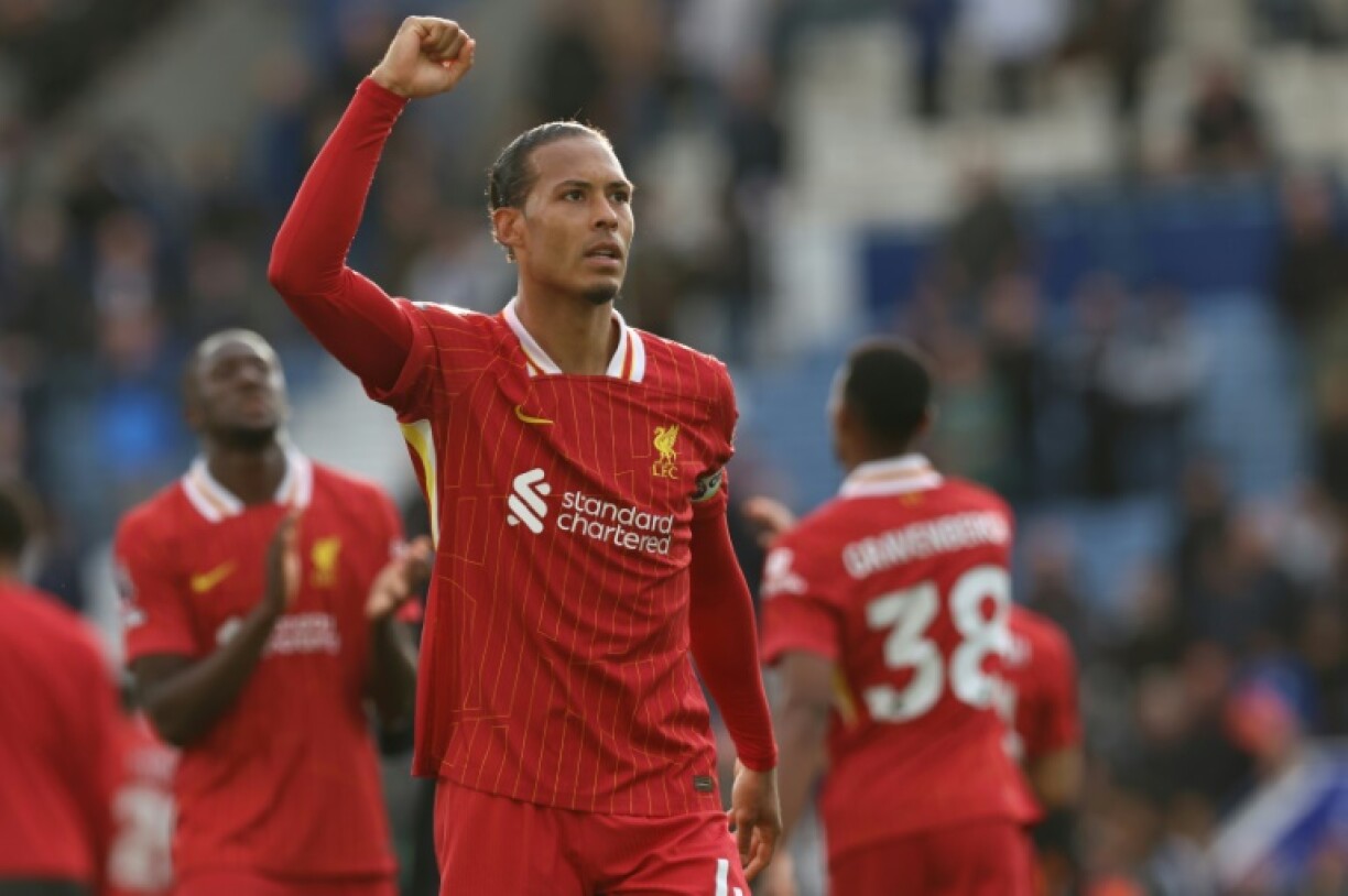 Liverpool's Virgil van Dijk celebrates winning the Premier League title
