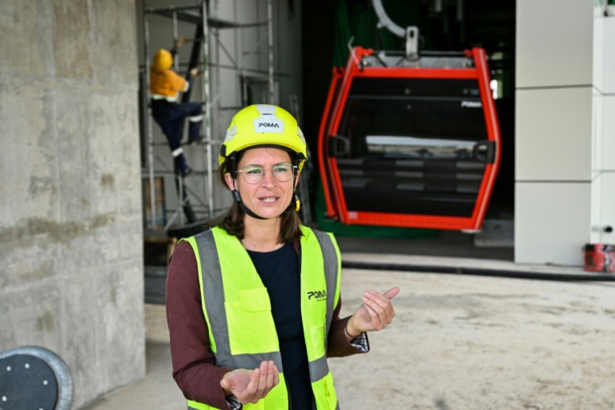 Project manager Cecile Broi says the cable car will cut a three-hour journey to just minutes when it is up and running