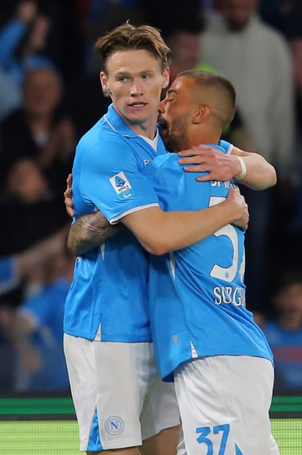 Scott McTominay (L) scored two goals in the first half to send Napoli outright top of Serie A