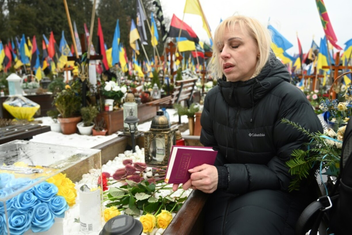 Natalia reads poems to her dead husband in Lviv