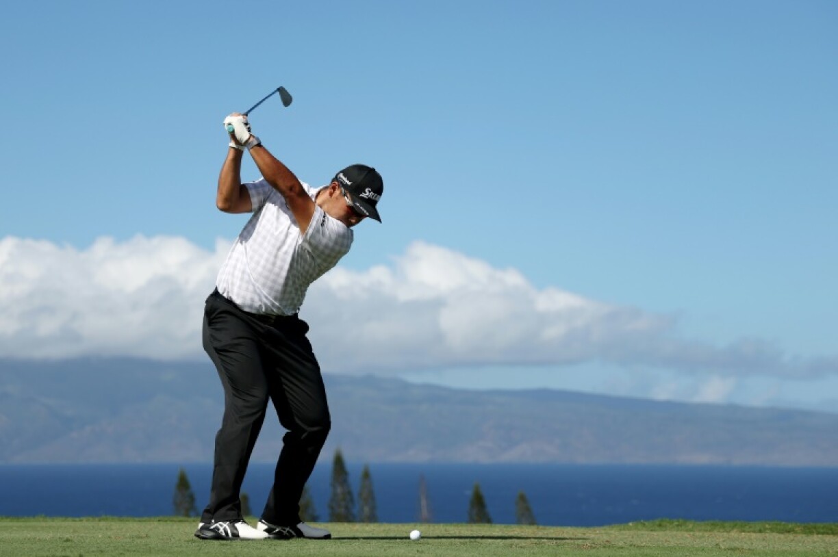 Leader Hideki Matsuyama of Japan plays his shot from the 11th tee during the second round of The Sentry at Plantation Course at Kapalua Golf Club on Friday.