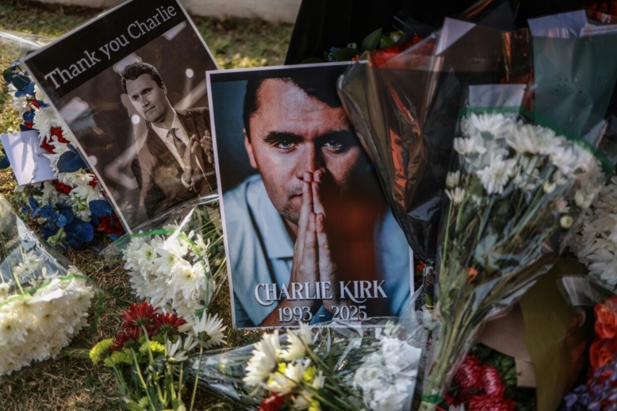 Mourners laid memorial wreathes outside the US embassy in South Africa after the slaying of Charlie Kirk