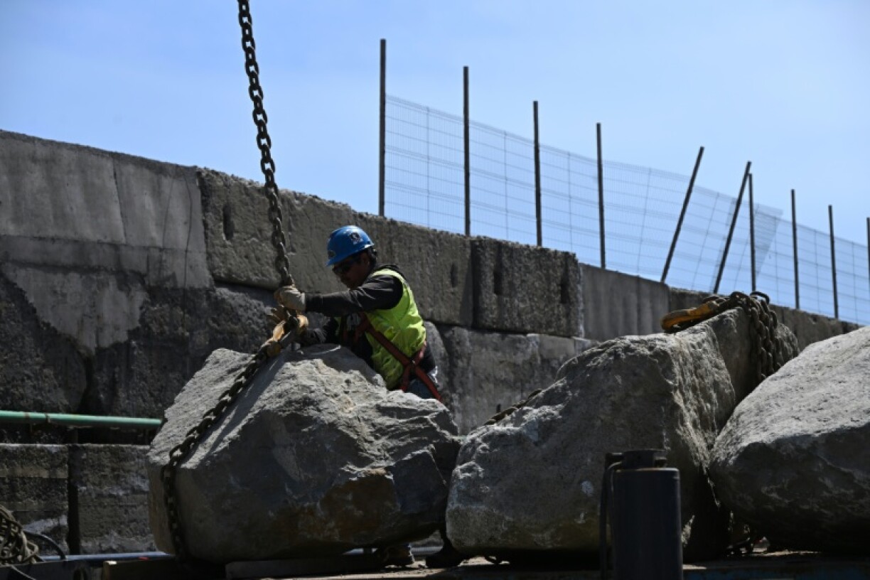 The breakwater at San Antonio is expanded as part of a multi-million-dollar project to boost the port's storm defences
