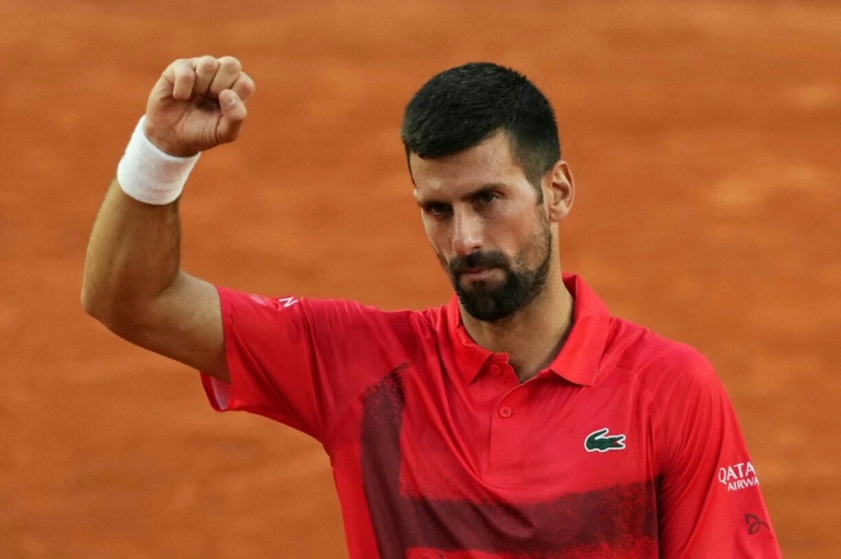 Moving on: Novak Djokovic is through to the French Open third round for a record 20th time