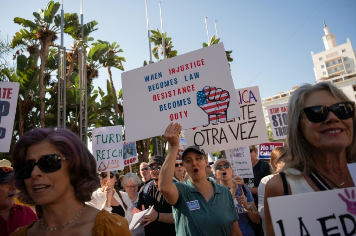 Demonstrators protest against US President Donald Trump in Malaga, Spain