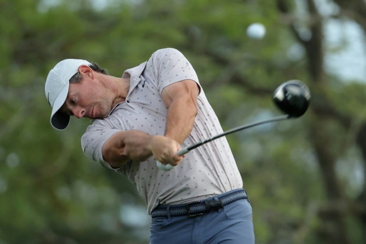 Four-time major winner Rory McIlroy of Northern Ireland smacks a tee shot as he prepares for next week's Masters tournament, where he can complete a career Grand Slam