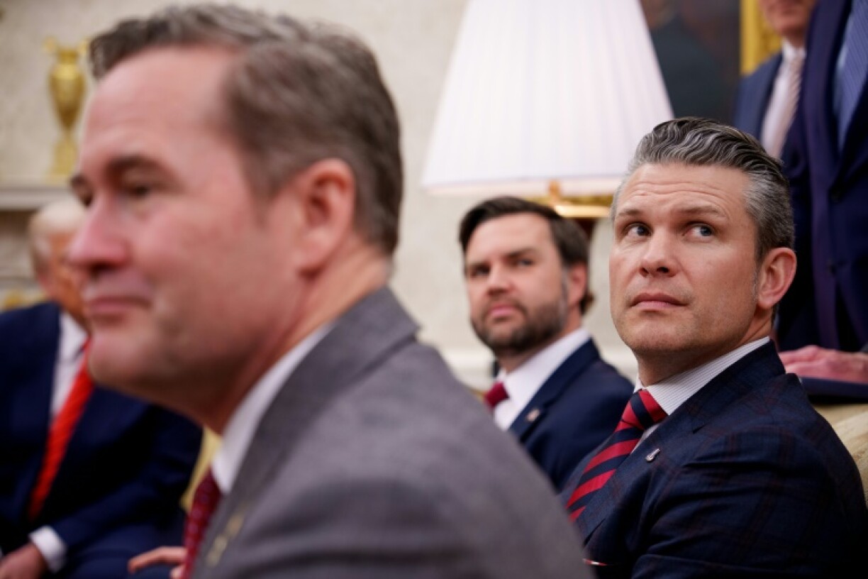 Top Trump administration officials including National Security Advisor Mike Waltz (L), Vice President JD Vance (C), and Defense Secretary Pete Hegseth (R) were all in the chat group