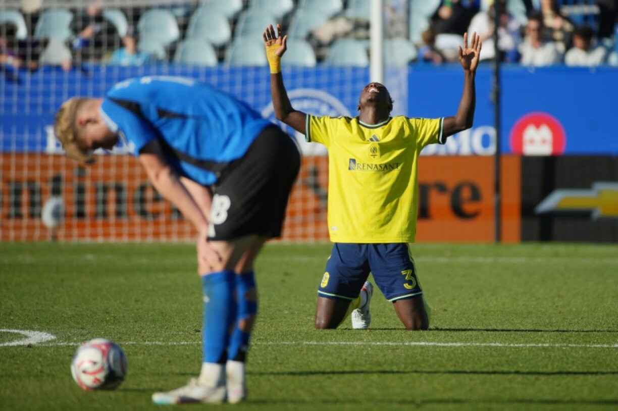 Nashville player Maxwell Woledzi celebrates victory over Montreal as the club clinched the MLS Supporters Shield