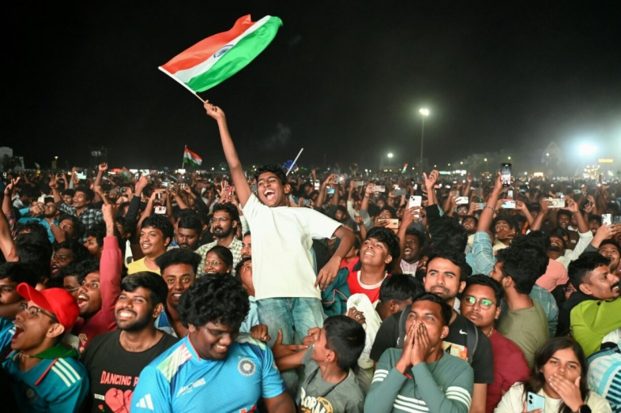 Indian fans watch the Champions Trophy final at Elliot's Beach in Chennai