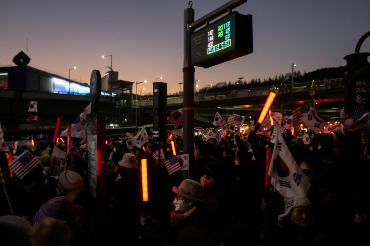 The suspended president's die-hard supporters raced to Seoul to support him