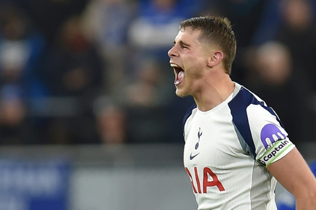 Tottenham defender Micky van de Ven celebrates scoring against Everton