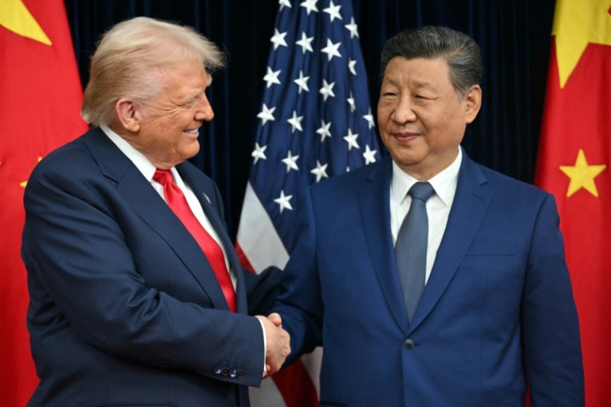 A rare meeting between US President Donald Trump and Chinese leader Xi Jinping temporarily stabilised relations, analysts said, and drew cautious optimism on the streets of Beijing