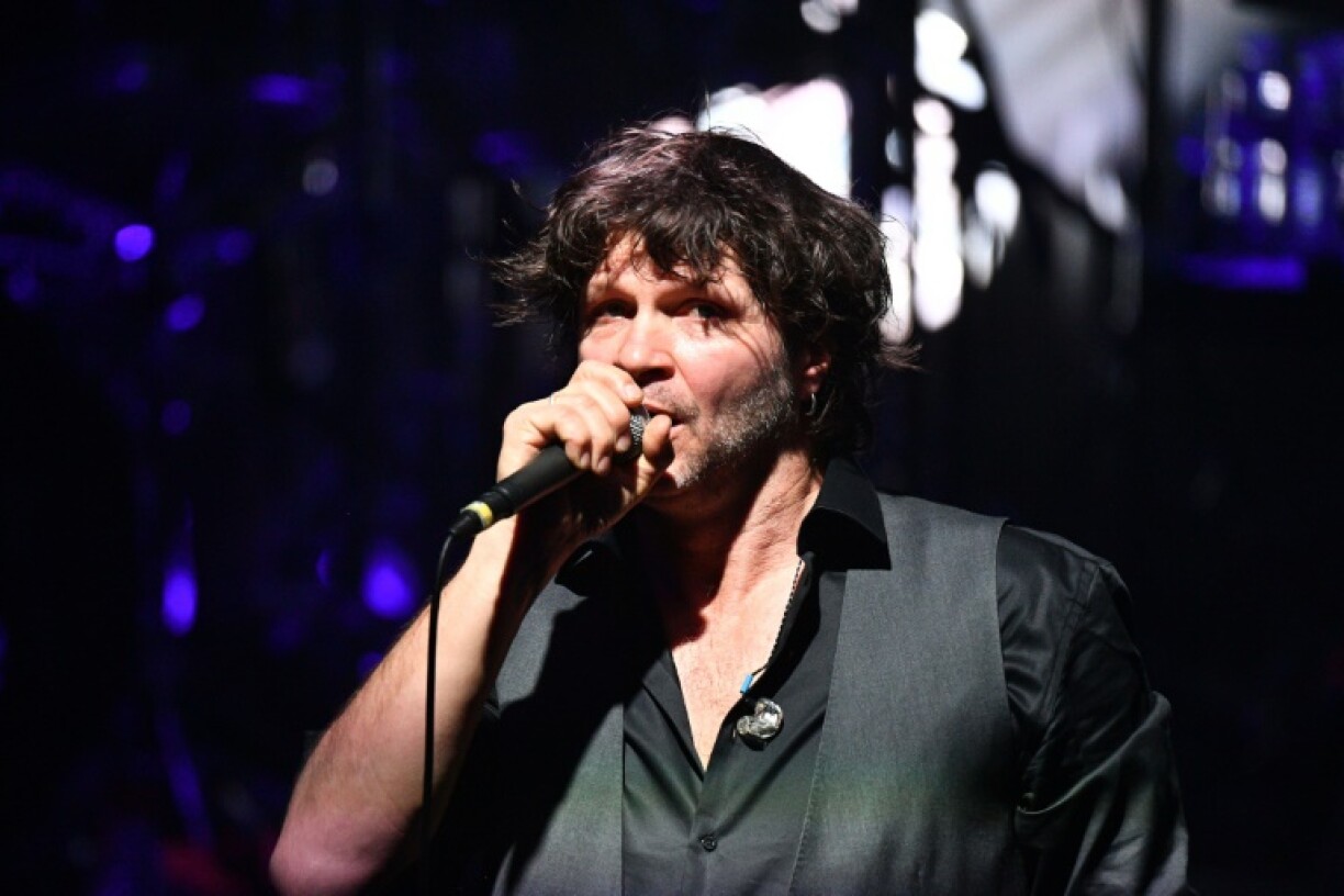 Bertrand Cantat performing at a concert in 2018 despite calls for boycotts and protests