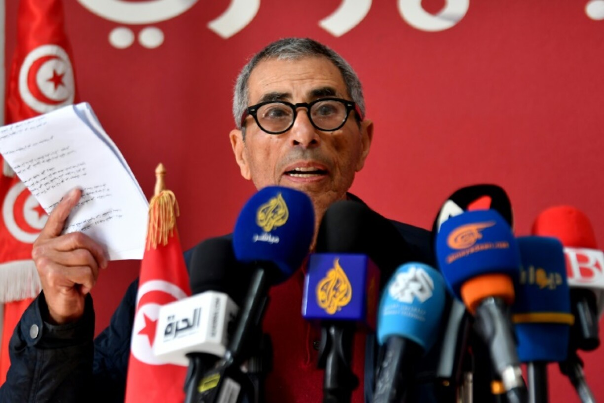 Left-wing Tunisian activist Ezzeddine Hazgui, a member of the defence committee for detainees accused of involvement in a conspiracy case against state security, addresses a press conference in Tunis on February 27