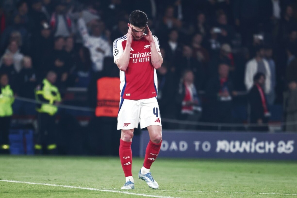 Arsenal's Declan Rice reacts after their Champions League loss to Paris Saint-Germain
