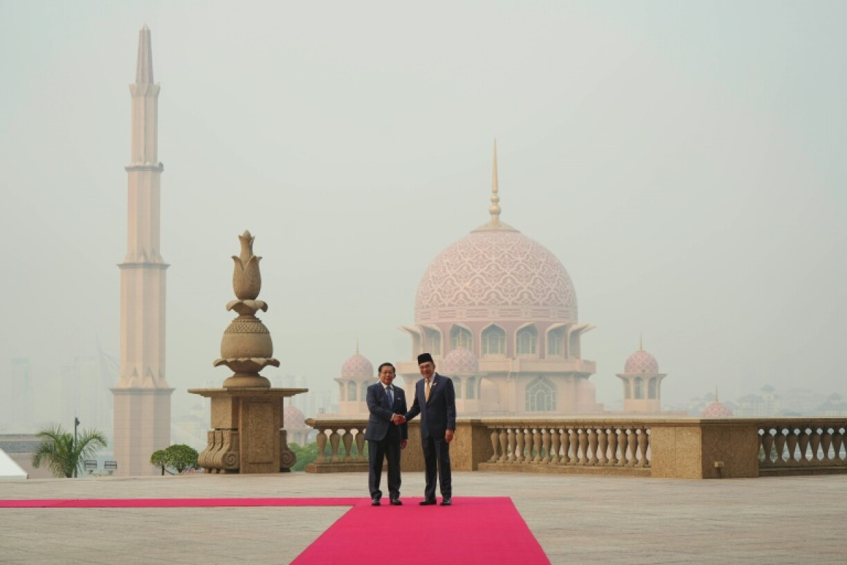 Malaysia’s Prime Minister Anwar Ibrahim welcomes Myanmar’s President Min Aung Hlaing