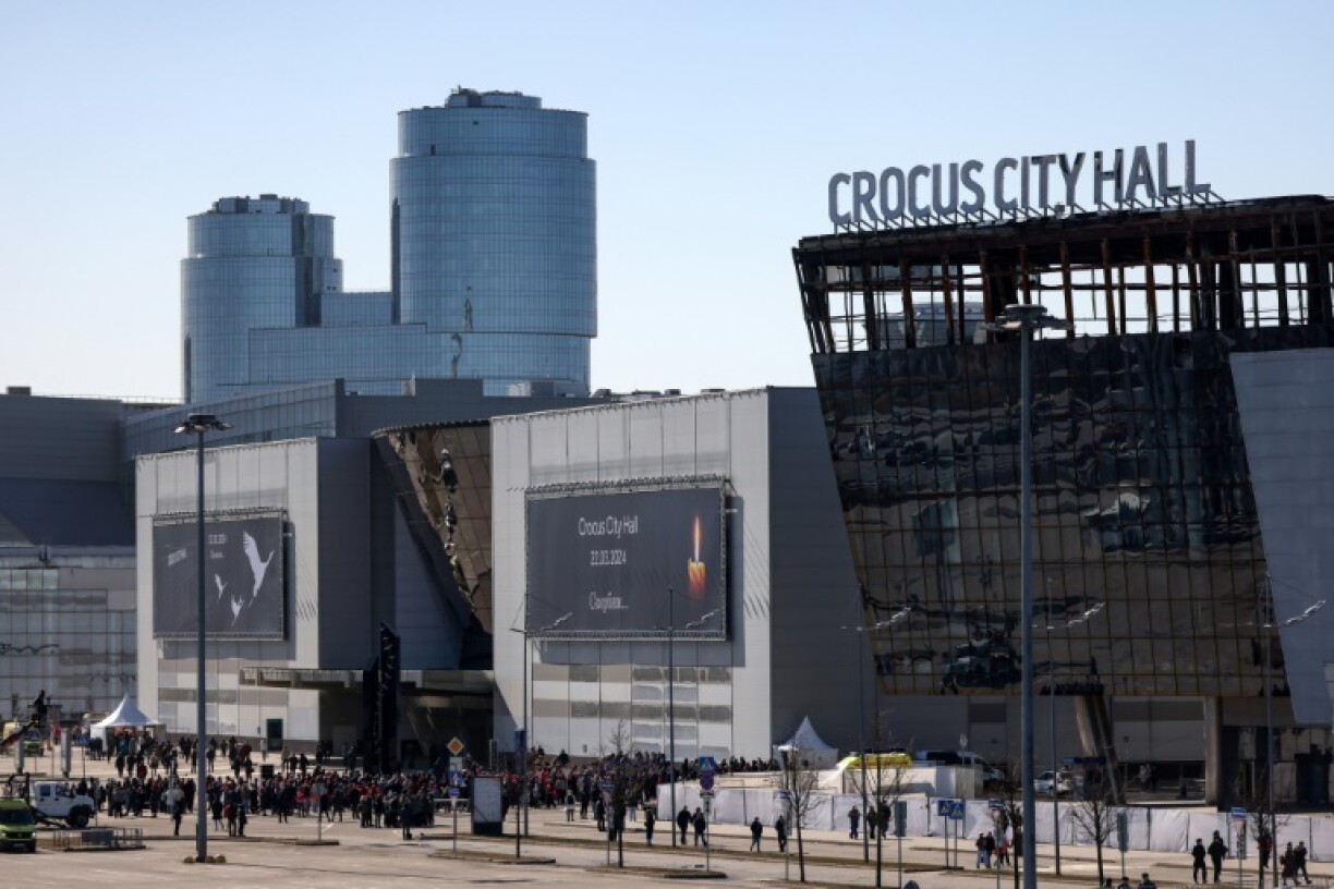 After the shootings, the assailants set the hall on fire and fled the scene