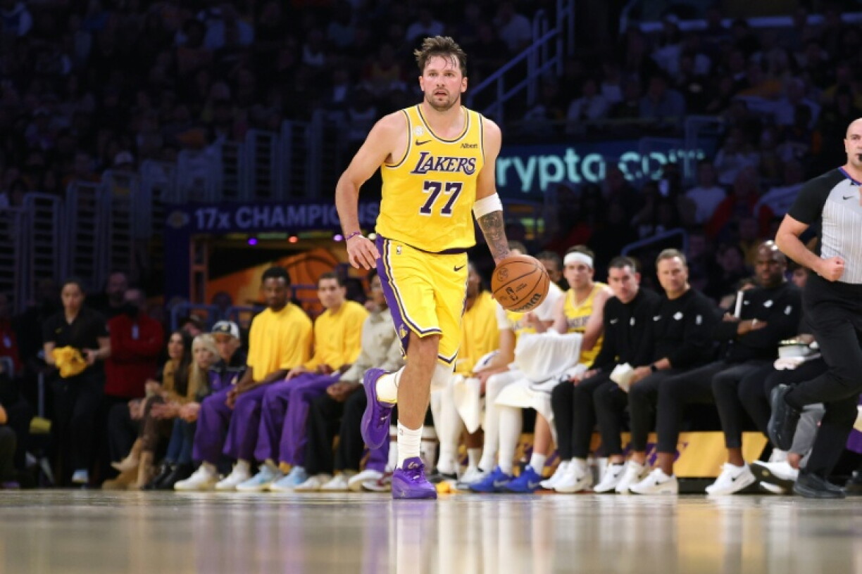 Luka Doncic lead the Los Angeles Lakers to an NBA season-opening win over the Golden State Warriors