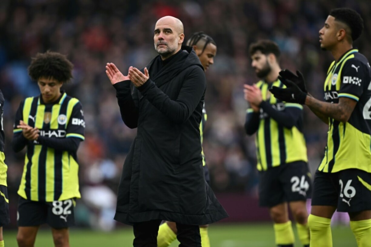 Pep Guardiola (C) believes his Manchester City players will rediscover their confidence in spite of another loss at Aston Villa
