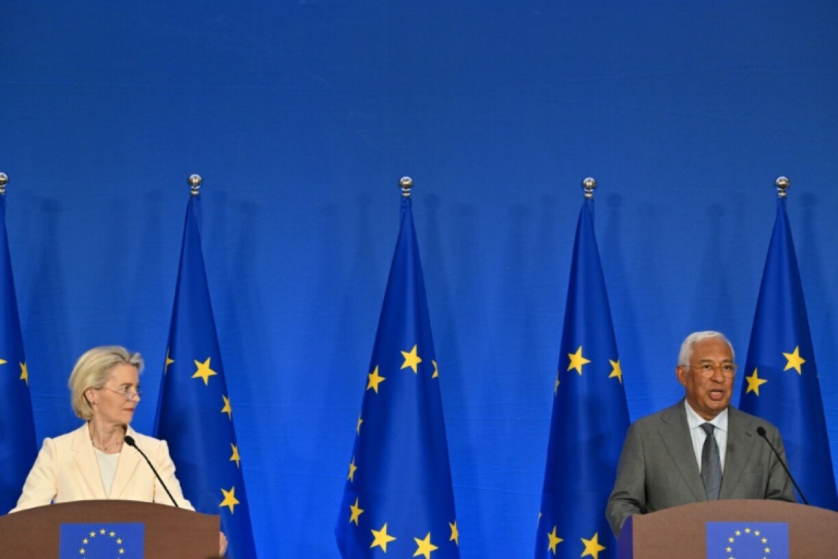 EU chief Ursula von der Leyen (L) warns that China's ties with Russia were now the 'determining' factor in its relations with the European Union