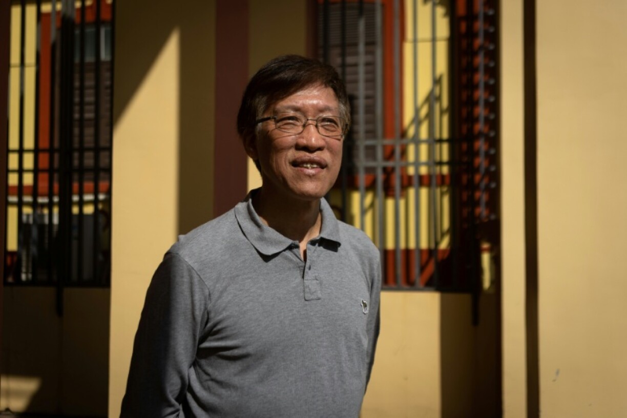 Au Kam-san, a primary school teacher who became one of Macau's longest-serving pro-democracy legislators, poses for a photo in 2024